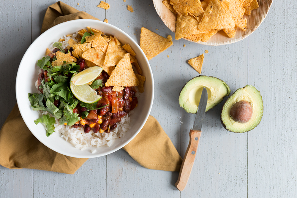 Easy food for easy days. Delicious with rice, tortilla chips, a mountain of coriander and of course lots of guacamole.